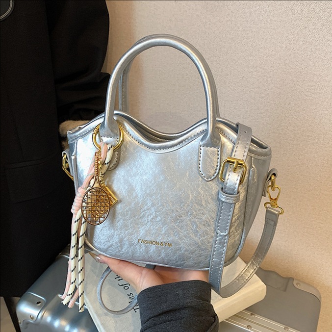 2025 nuevo bolso de mensajero casual de todo fósforo de moda, bolso de cubo portátil exquisito de alta gama, bolso de hombro de estilo occidental brillante