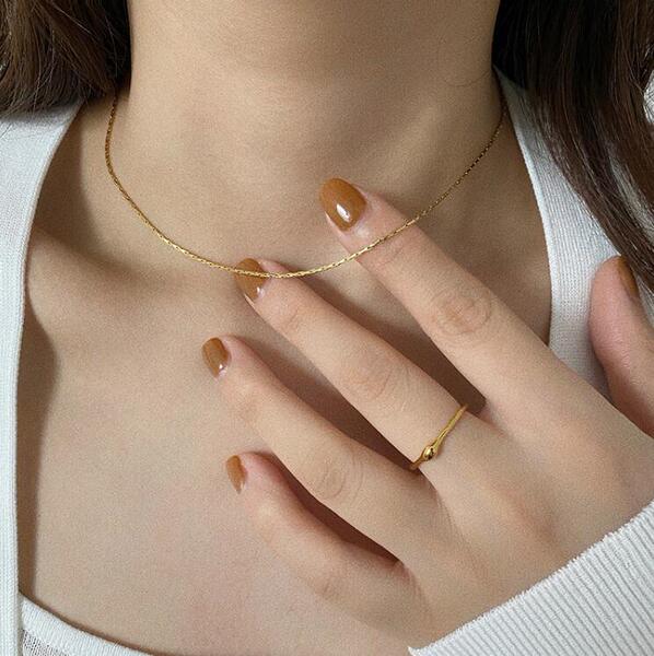 light and thin minimalistic fashionable golden necklace stainless…