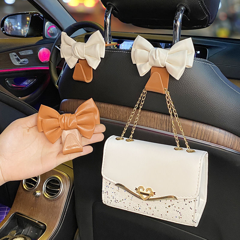 Garganto de automóvil Garganto de respaldo de silla Red cuero lindo arco multifuncional coche pequeño gancho de plástico