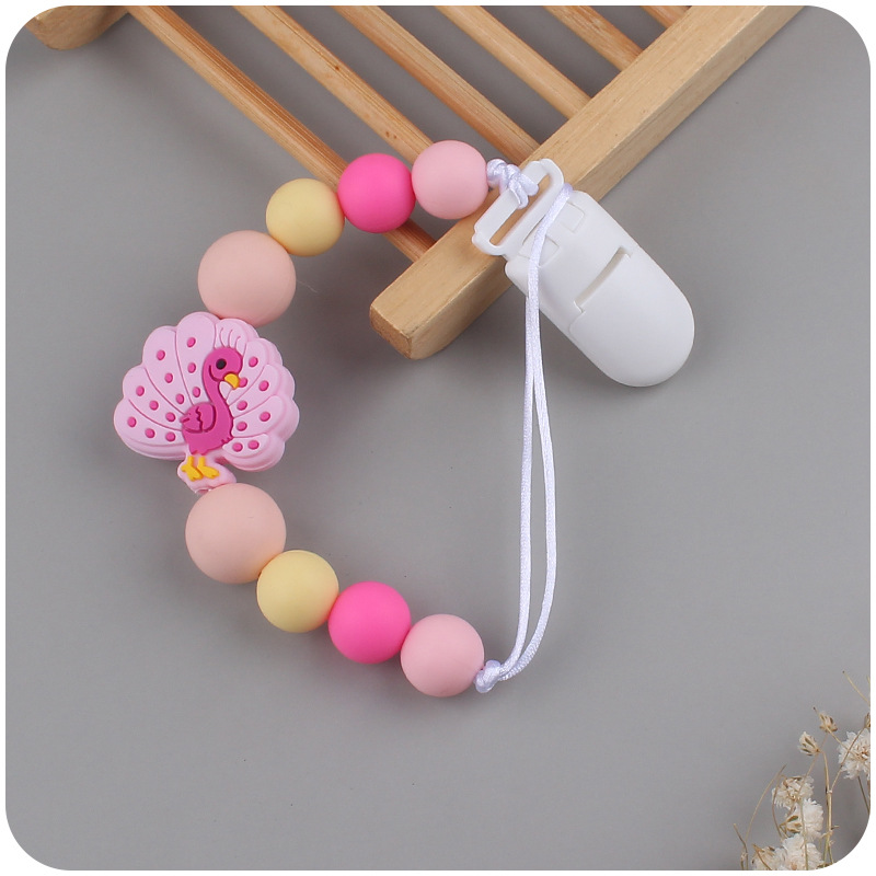 Nuevos suministros para bebés de dibujos animados animal Pavo Real teether calmante bebé cuentas de silicona mordedura molar pezón cadena