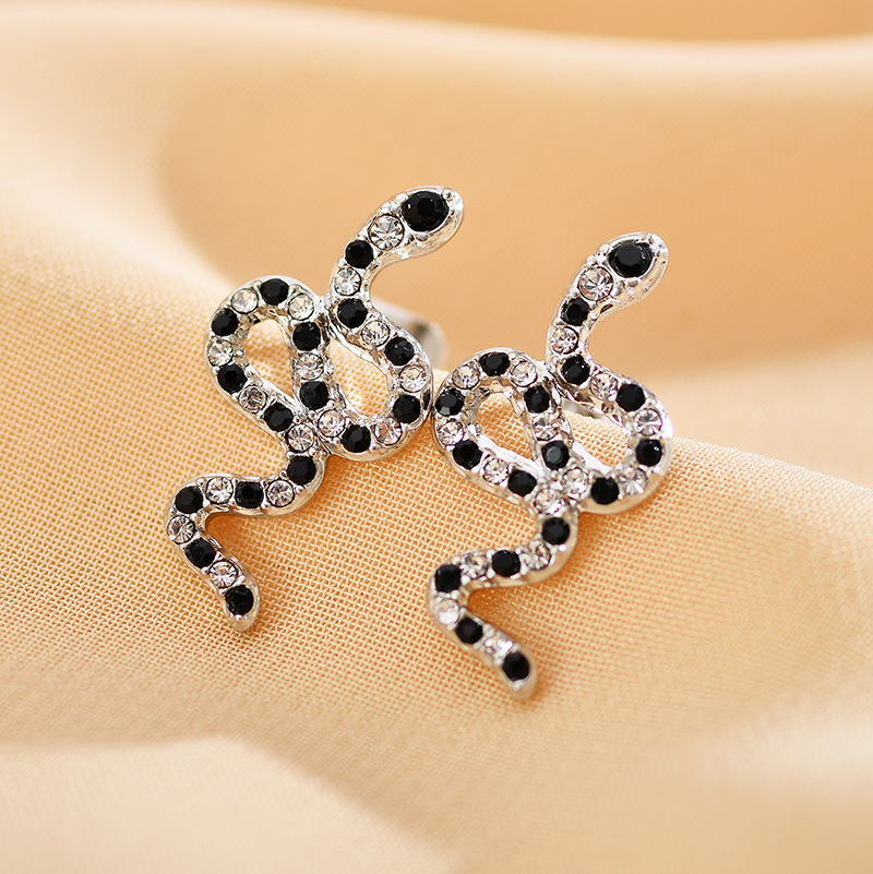 Street Occasion 1 Pair Ethnic Style Animal Palm Copper Plating Inlay Zircon Ear Studs