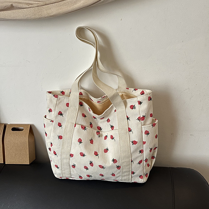 Coreano ins chica impresión de fresas viaje mochila 2025 nueva gran capacidad velcro bolsa de mano casual