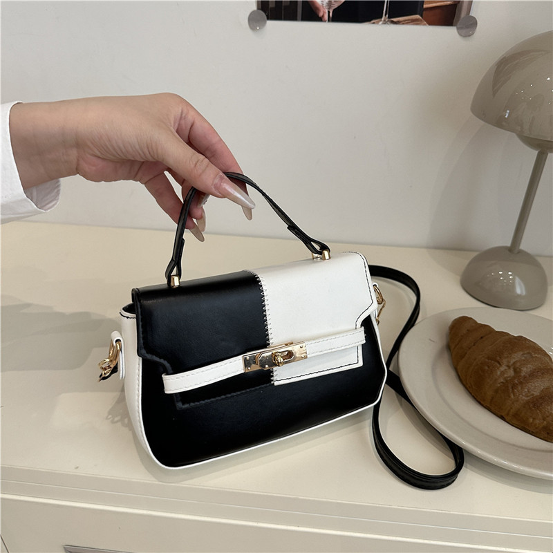 Bolsos de mujer de color de contraste de costura 2025 nuevo bolso de moda transfronterizo de un solo hombro diagonal bolso de silla de mujer de estilo explosivo
