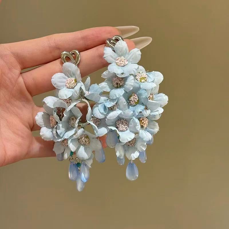 Pendientes de borla de cuentas de arroz de flor de gasa de aguja de plata Pendientes de todo fósforo de estilo de vacaciones Pendientes frescos y dulces para mujer