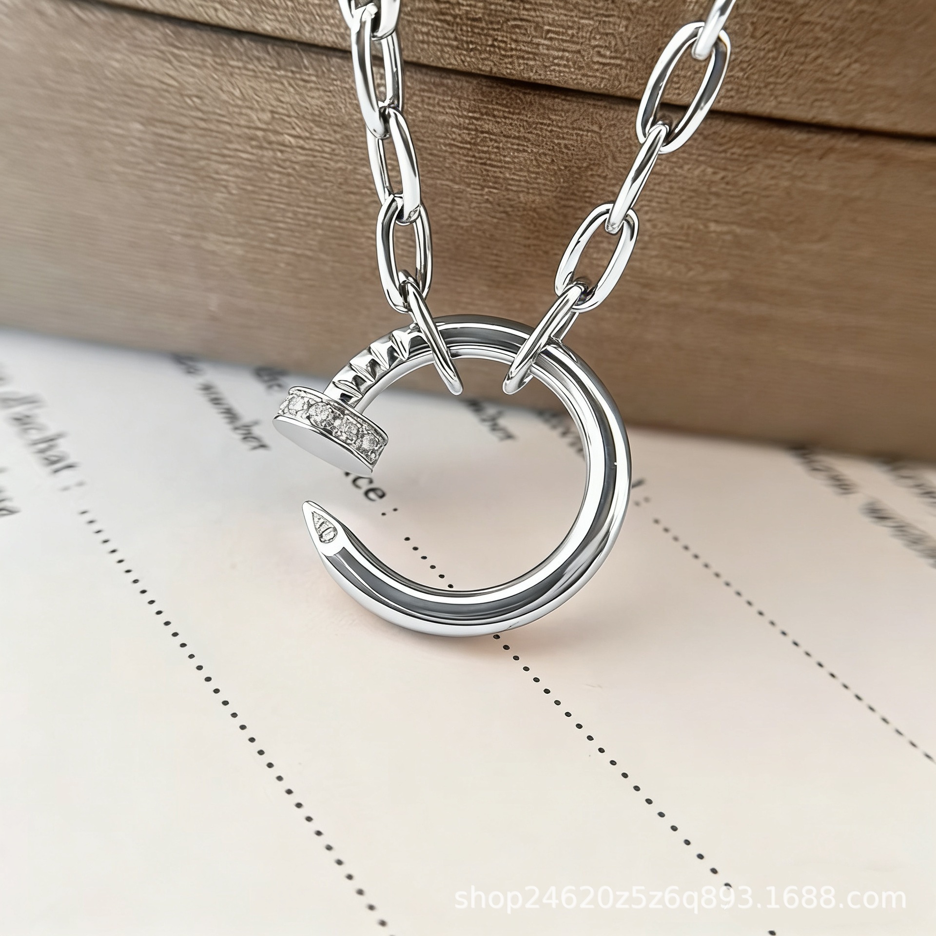 Thick chain platinum head and tail diamond nail necklace
