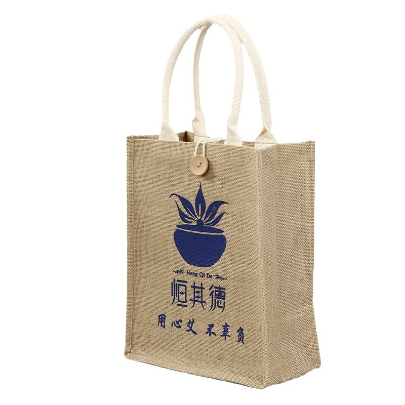 現物の麻の袋と同じ黄麻のショッピングバッグのプレゼントのレトロな亜麻の手提げ袋の空白の手描きの麻の布のカバンは注文します。|undefined