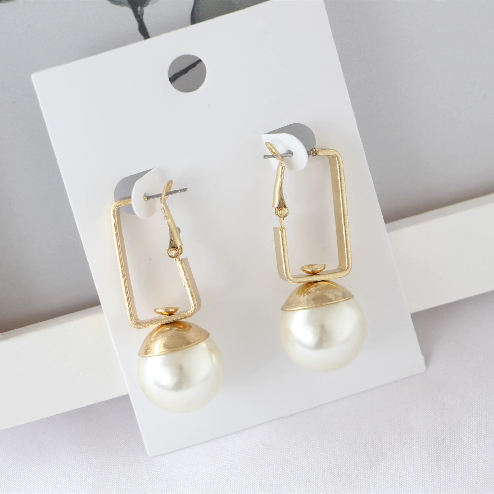 Design earrings from pearl, accessory, trend of season, wholesale