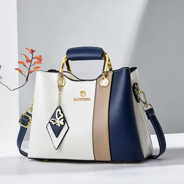 2025 nuevo bolso de mujer de mediana edad de color en contraste bolso de axila casual de todo fósforo bolso de madre de temperamento bolso de mensajero portátil de un solo hombro