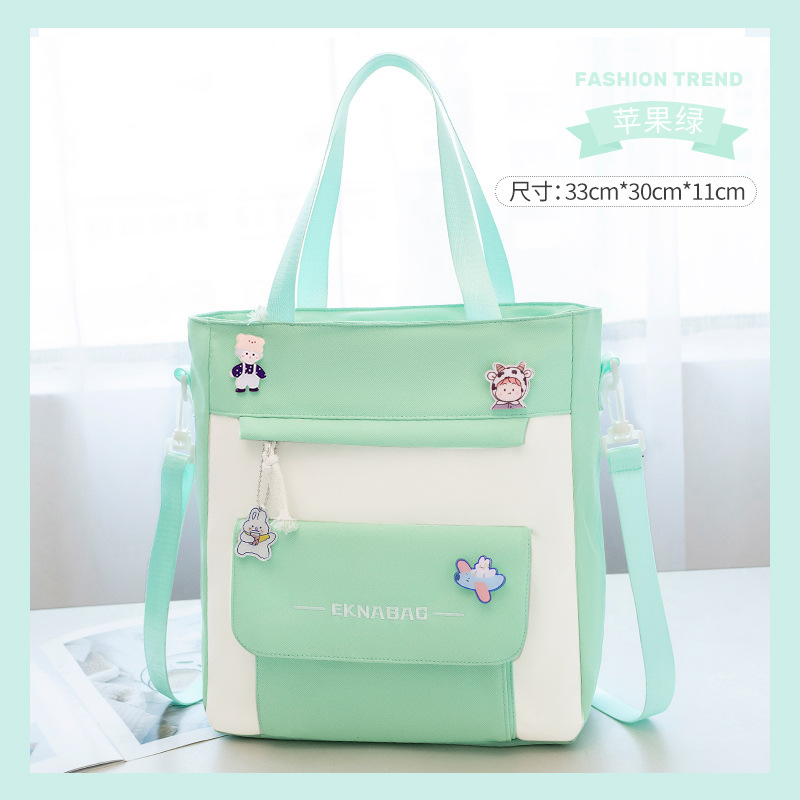 Bolso de matrícula de gran capacidad Bolso de hombro para estudiantes de primaria Bolso de mano Macaron Bolso de reparación de doble hombro Bolso bandolera de arte cruzado