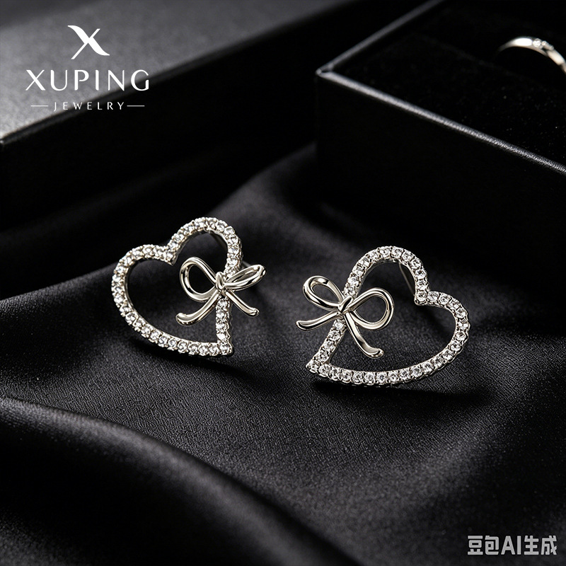 Xuping estilo simple chapado blanco suave arco de viento amor temperamento elegante pernos de orejas para mujeres orejas al por mayor