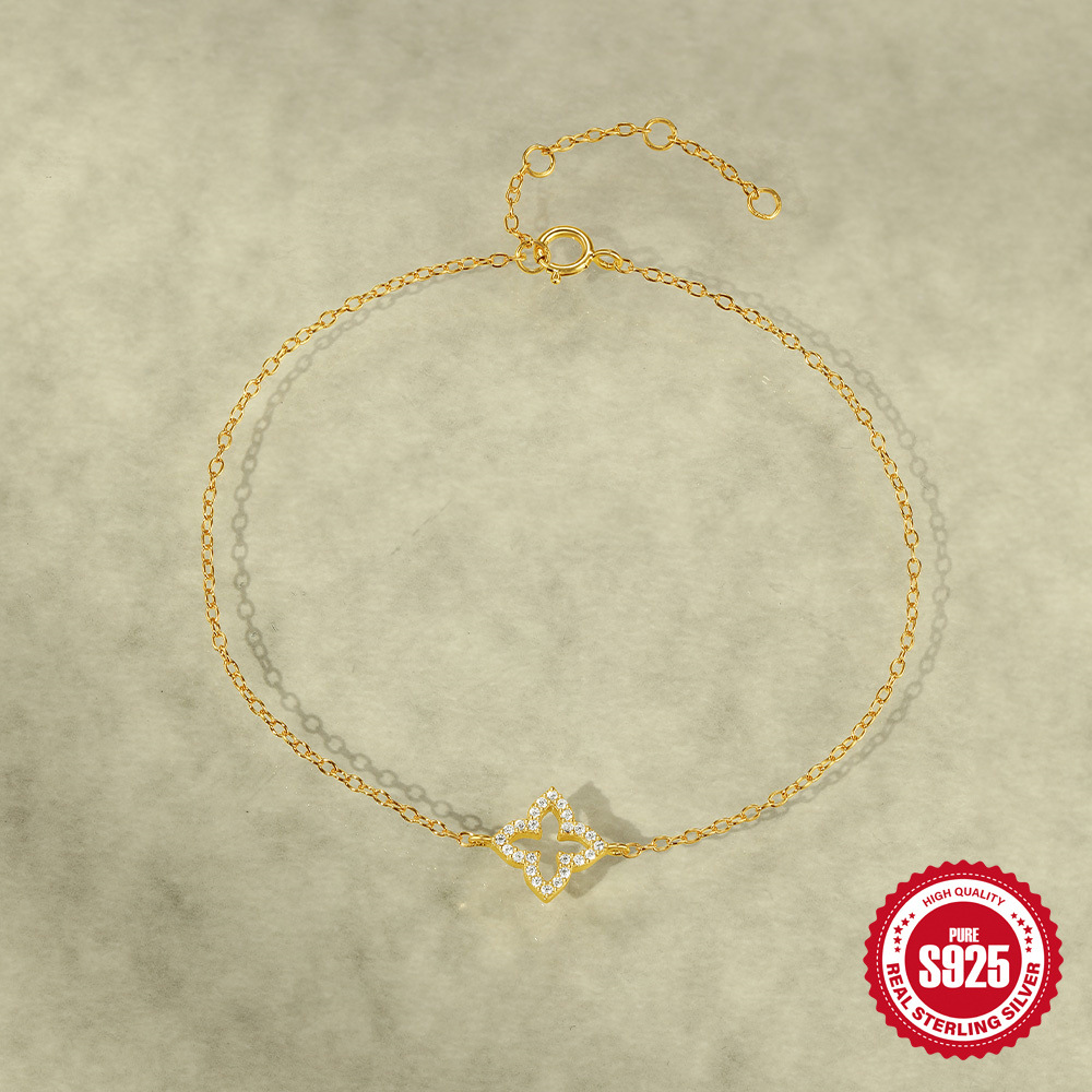 Pulsera de plata S925 caliente, trébol de cuatro hojas hueco, personalidad, moda, joyería clásica de mano de trébol