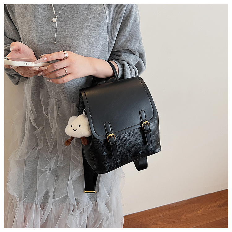 This is a niche design for women, featuring cartoon animal prints. It is a pink backpack with a high level of appearance and large capacity for travel undefined