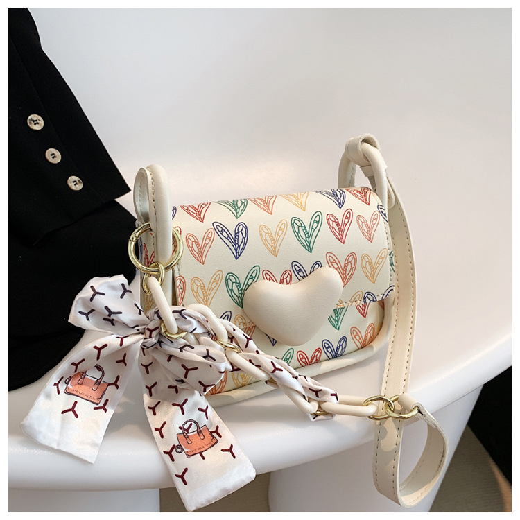 Women's Medium Pu Leather Heart Shape Fashion Ribbon Square Flip Cover Crossbody Bag display picture 3