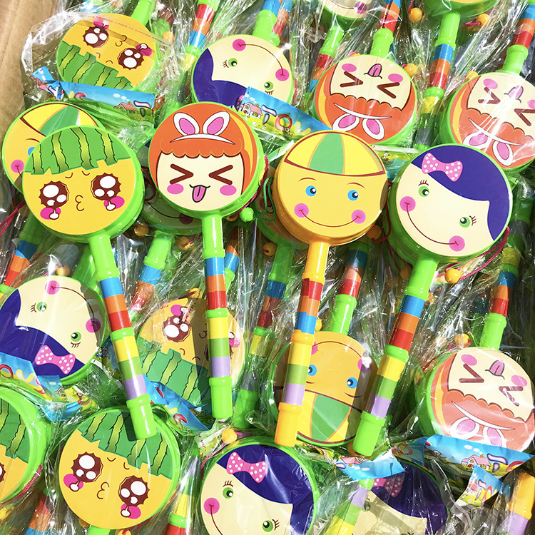 Wholesale children's musical instrument smiley face hand rattle small rattle toy 20cm sound Hongliang department store wholesale