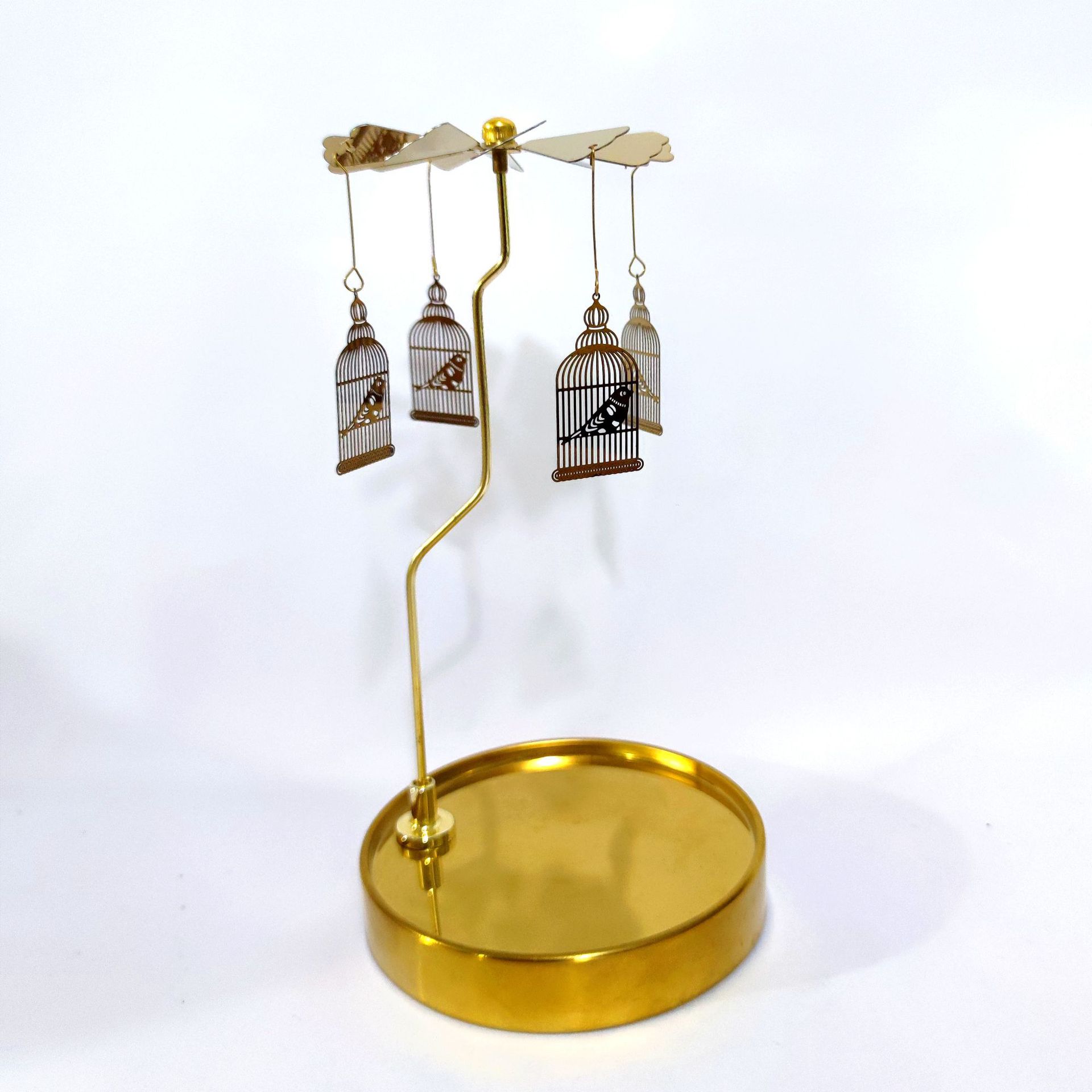 Fuente fabricante al por mayor Amazon INS bandeja redonda de acero inoxidable linterna giratoria giratoria candelabro de aromaterapia giratoria