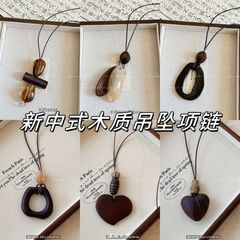新中式镂空木质圆形吊坠项链女民族风小众设计毛衣链复古挂脖配饰