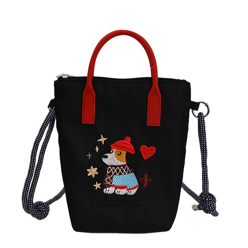 2026 nuevo estilo de alto nivel de sentido perezoso viento bordado portátil tipo cubo bolso de teléfono móvil lindo tela de nylon de color sólido mochila