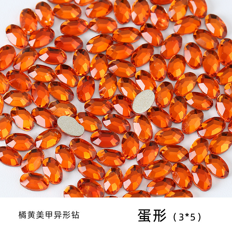 オレンジ色の異形ドリルの美甲ドリルのアクセサリーの卸売りは浦江工場の水ドリルの愛の水滴の馬の目のガラスのドリルを混ぜます。|undefined
