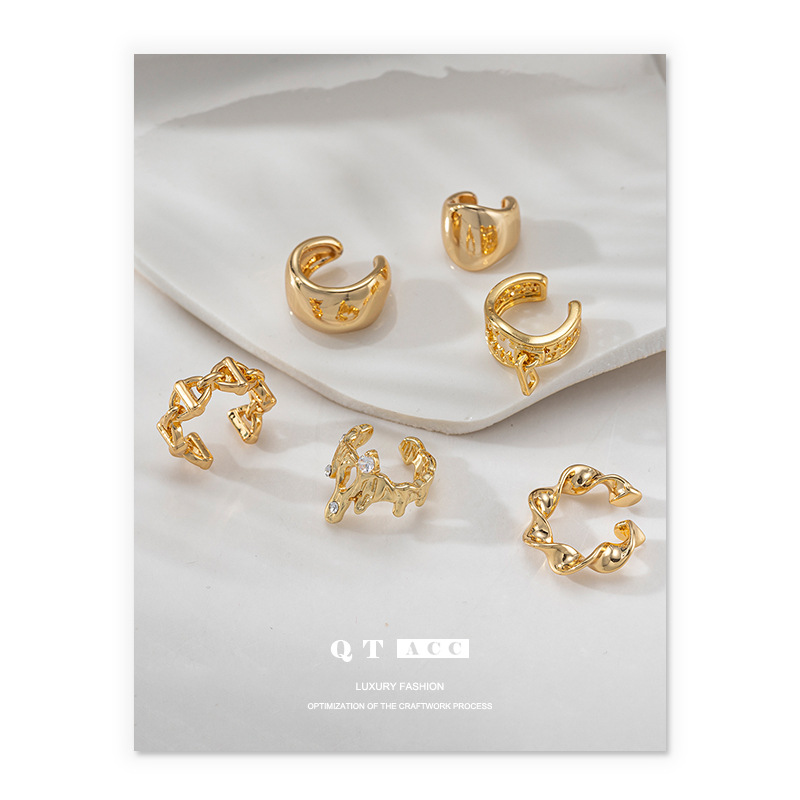 Lujo ligero, sentido de alta gama, personalidad clásica, pendientes irregulares, diseño de apertura, clip de hueso de oreja, moda, venta caliente de verano versátil