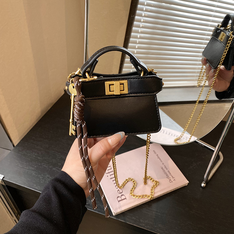 Coreano simple bolso de niña de color sólido mini bolso de bebé 2026 bolso para niños de comercio exterior transfronterizo
