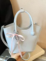 Compact summer handheld small bag, city style, top handle and shoulder strap, with/without pendant