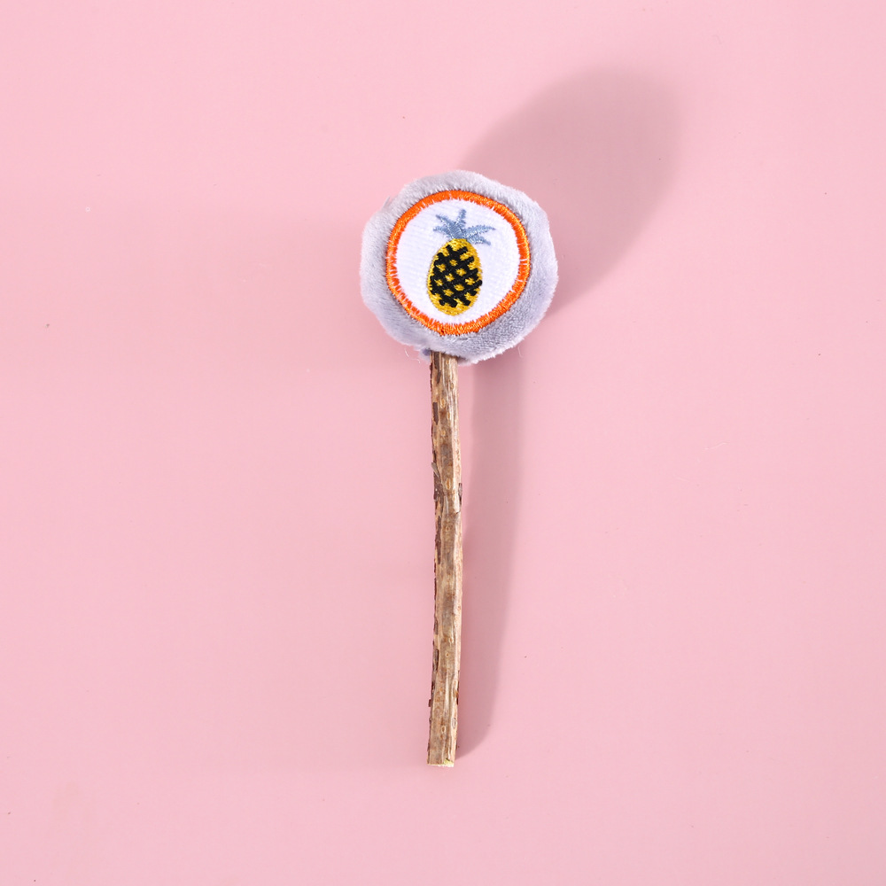 Gatito mascota de dibujos animados felpa fruta del caramelo gato garra Lollipop mu Tianmiao limpieza diente congestionado molienda palo juguete