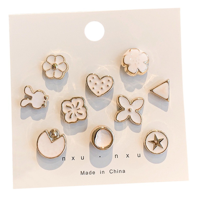 Ropa fija broche lindo pin japonés escote Decoración Accesorios anti-exposición pecho pin hebilla insignia hombres y mujeres