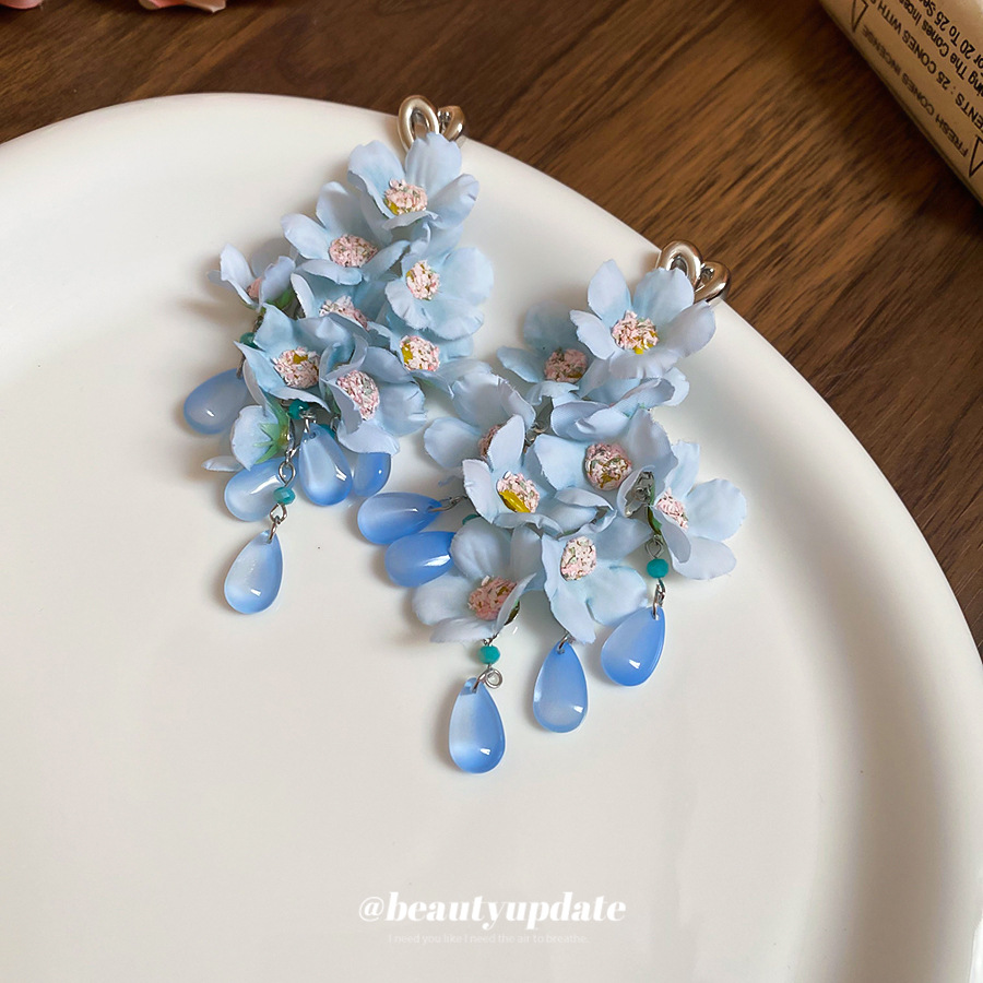 Pendientes de perla de flor azul de tela de aguja de plata Pendientes de ambiente fresco Pendientes de alta calidad de lujo ligero súper hada