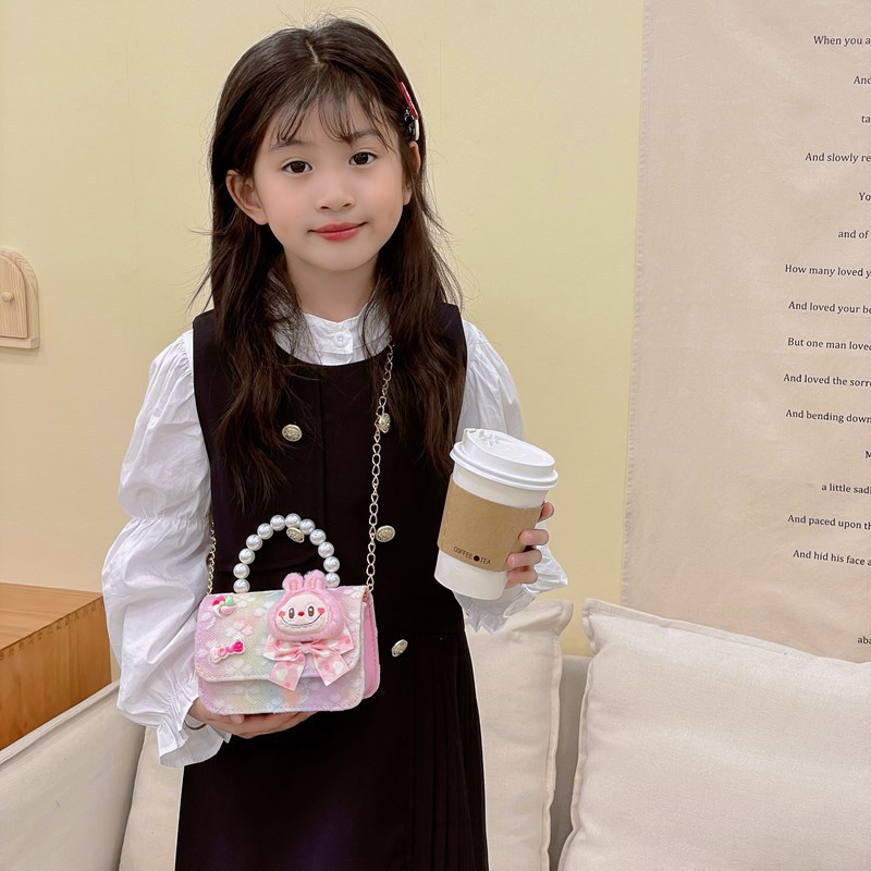 Bagos para niños 2025 nuevo estilo coreano de niña princesa bolso de cambio de mano lindo bolso de hombro de dibujos animados de peluche