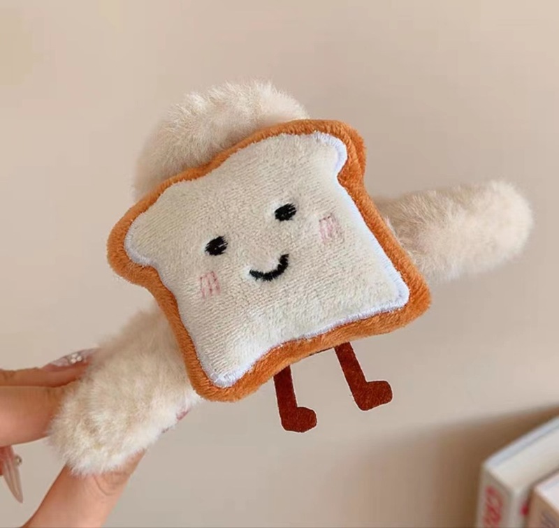 冬のぬいぐるみクリップの後頭部の大きい髪の毛がふわふわしています。|undefined