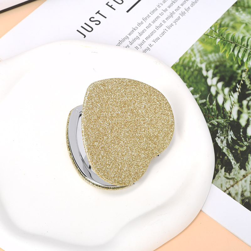 Espejo pequeño de amor de alto valor con mini dormitorio de estudiante espejo plegable de doble cara espejo de maquillaje portátil redondo