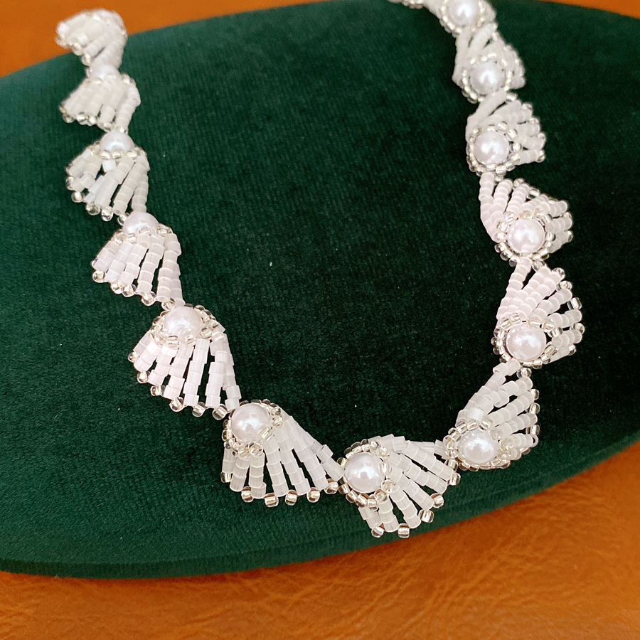 Temperamento retro collar de perlas de lujo ligero nicho de alta sensación de cadena de clavícula accesorios de vacaciones conjunto de joyería al por mayor