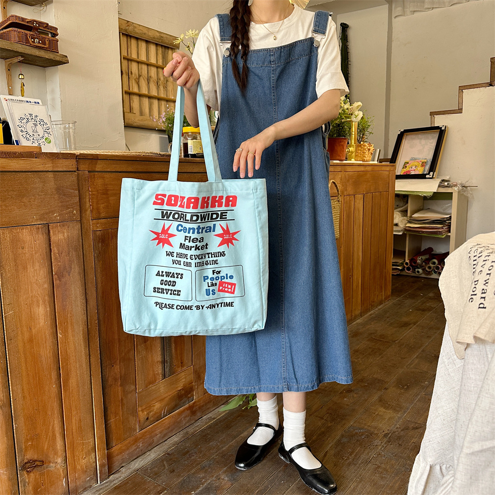 4423 New 2024 printed single-shoulder bag, large-capacity fabric bag, women's canvas bag, trendy hand-held commuting bag for work Item Picture