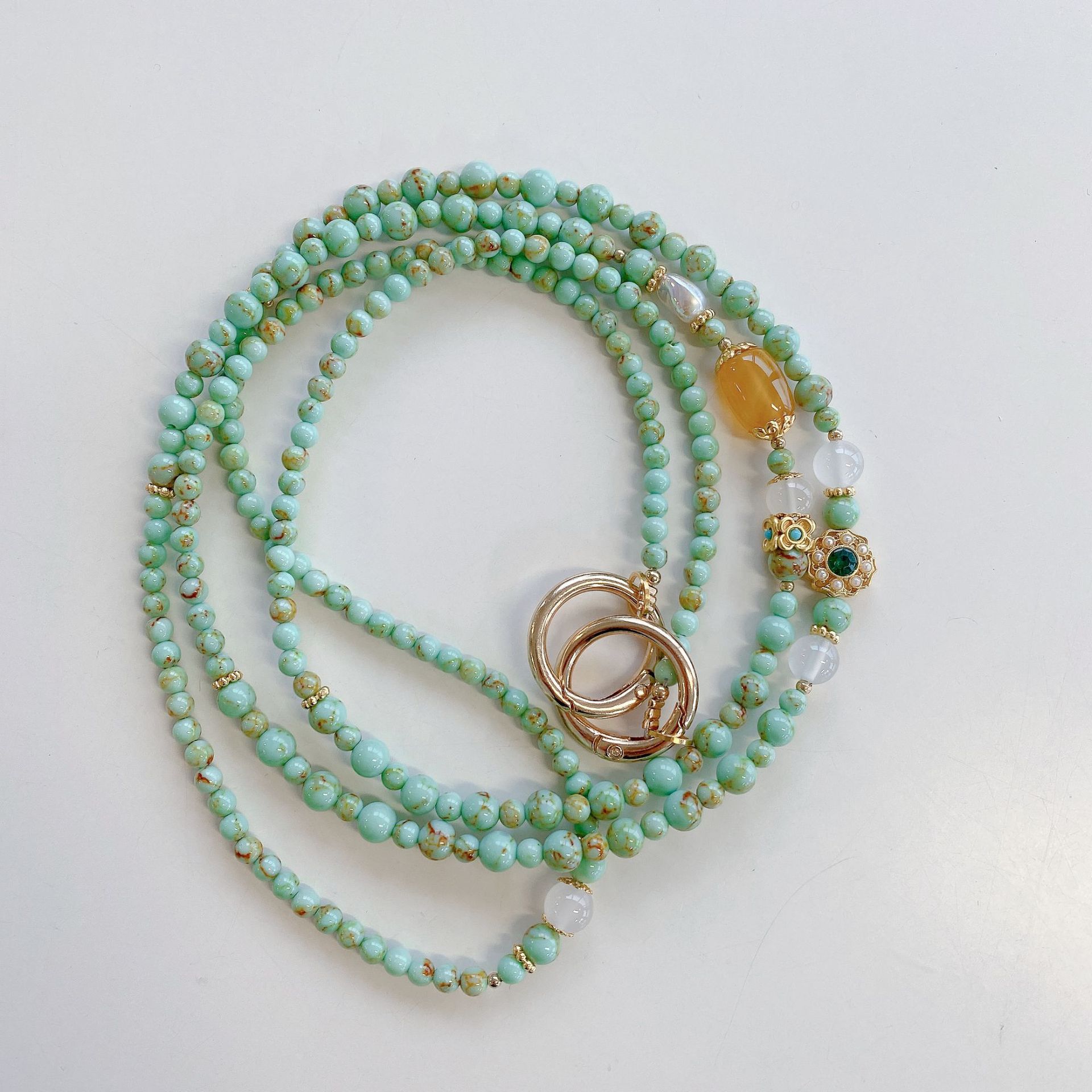 Cordón de lujo para teléfono hecho a mano de alta calidad para mujer, cadena larga con ágata y turquesa, correa cruzada moderna, accesorio para colgar en el cuello.