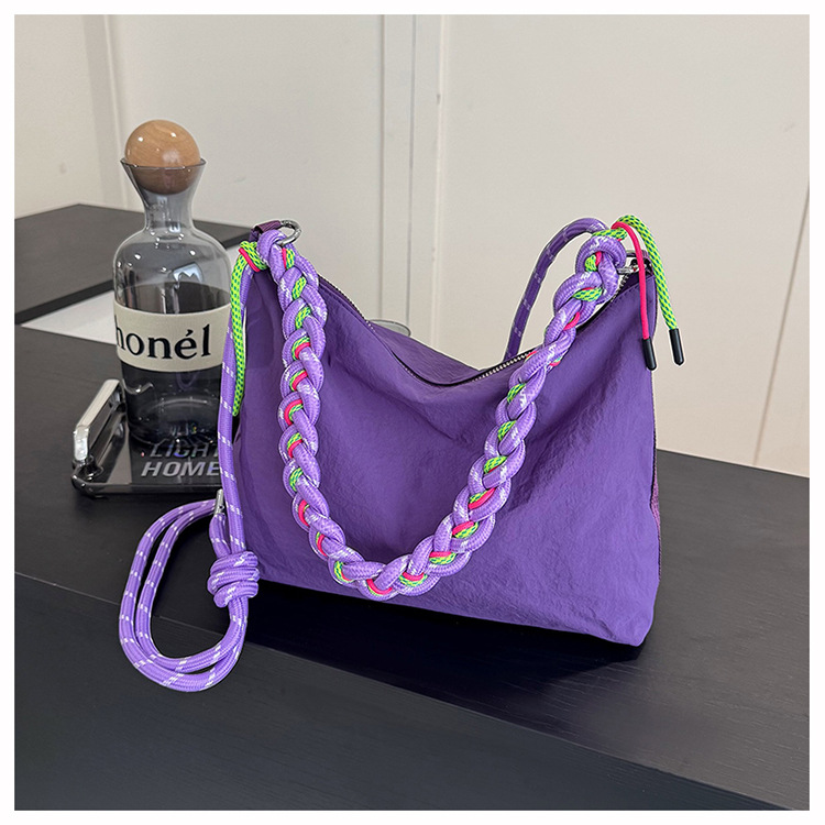 Bolso de tela de nylon de gran capacidad para mujeres 2026 nuevo estilo coreano simple bolso de mochila de nicho de tejido de viaje bolsa
