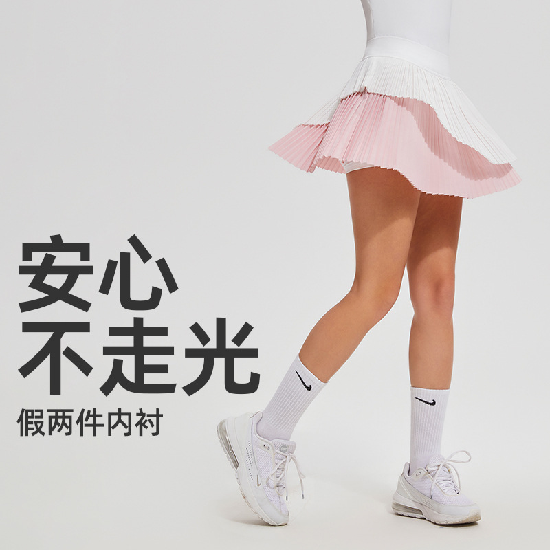 Verano nuevo vestido deportivo de cintura alta en forma de A anti-luz transpirable falso dos piezas de golf plegado pantalón corto vestido de mujer