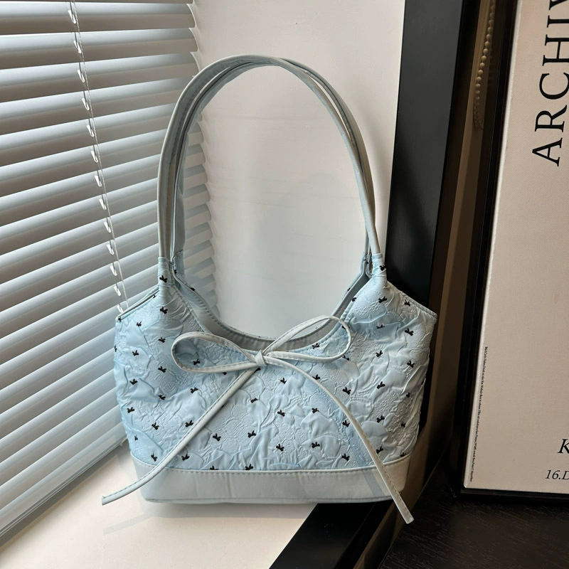 Universal capacious one-shoulder bag with bow