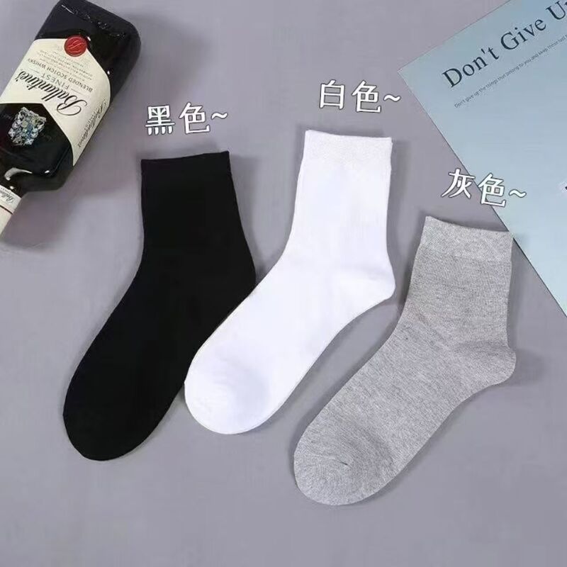 Mid-calf socks, available in black, white, and gray, for both men and women. These disposable socks are odor-resistant, absorbent, breathable, and come in solid colors. Suitable for casual and business wear, and on-trend Mid-calf socks, available in black, white, and gray, for both men and women. These disposable socks are odor-resistant, absorbent, breathable, and come in solid colors. Suitable for casual and business wear, and on-trend