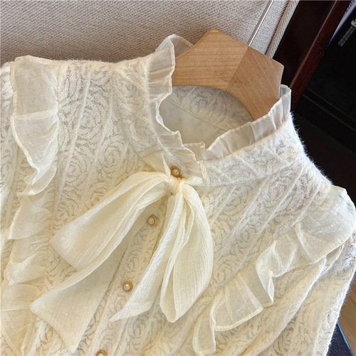 French-style designer solid-color bow shirt for women—winter base layer, chic little top with flowing ribbons and lace-matching long-sleeved blouse.