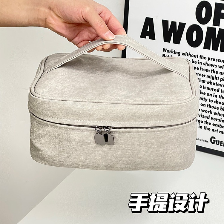 2023 nueva bolsa de cosméticos dos en uno bolsa de almacenamiento de alto aspecto bolsa de artículos de tocador de viaje simple de gran capacidad de estilo europeo