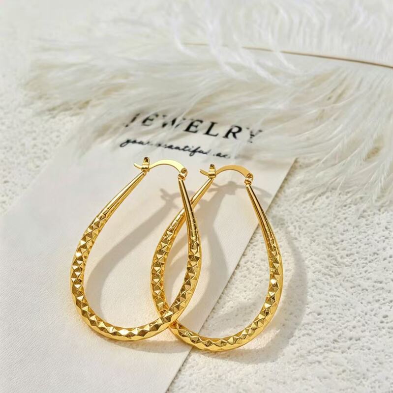 Hot-Selling Exaggerated Water Drop Glossy Women's Earrings in Hong Kong, Simple and Fashionable Versatile Hoop Earrings with a Unique Design