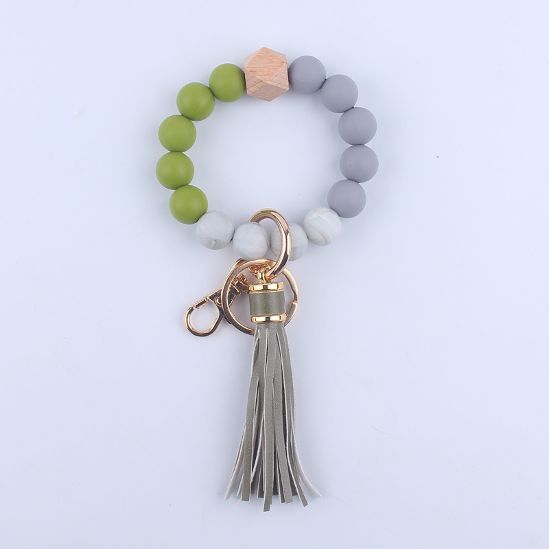 Nuevo cuero de LA PU corto Borla Llavero DIY de silicona de impresión de leopardo de color sólido con cuentas muñeca llavero colgante