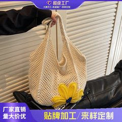 国境を越えたファッションは大容量の花草編みの特包女性2025新型リゾートビーチ編みショルダーバッグ
