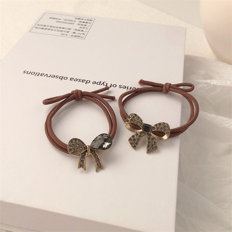 Retro aleación de diamante arco toque de cabello cuerdas de goma anillo de cabello de alta elasticidad y duradera toque de cabello