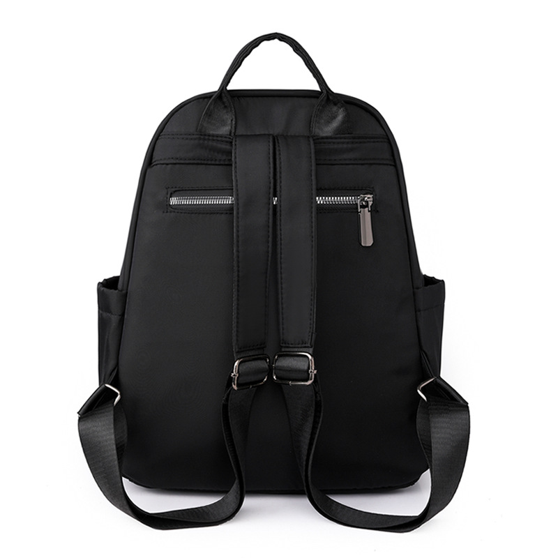 Spot al por mayor 2023 nueva mochila de nailon para mujer coreana simple y ligera mochila de viaje al aire libre mochila escolar de moda