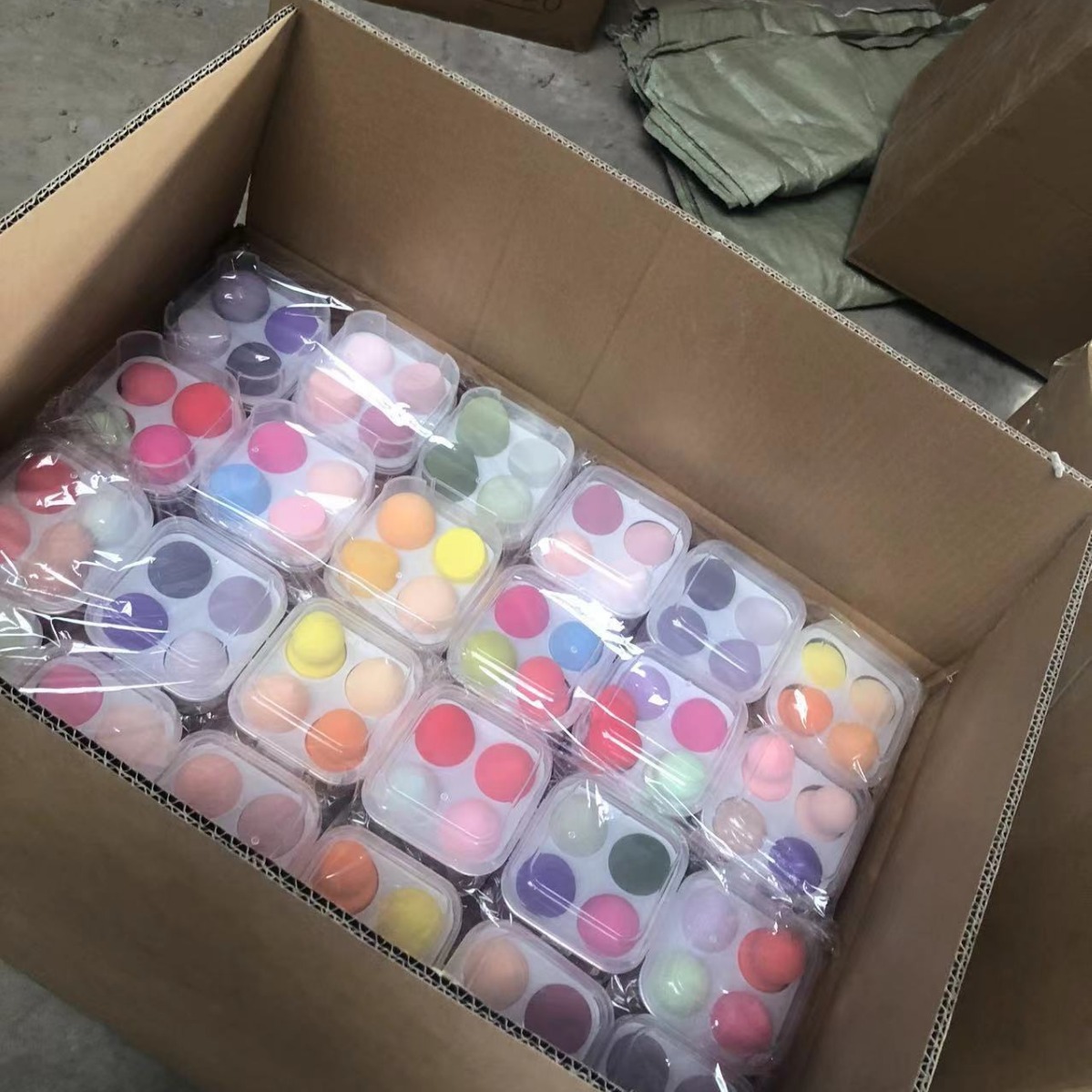 Conjunto de huevos de maquillaje transfronterizo super suave sin polvo de cosméticos almohadilla de aire polvo de doble uso esponja desechable