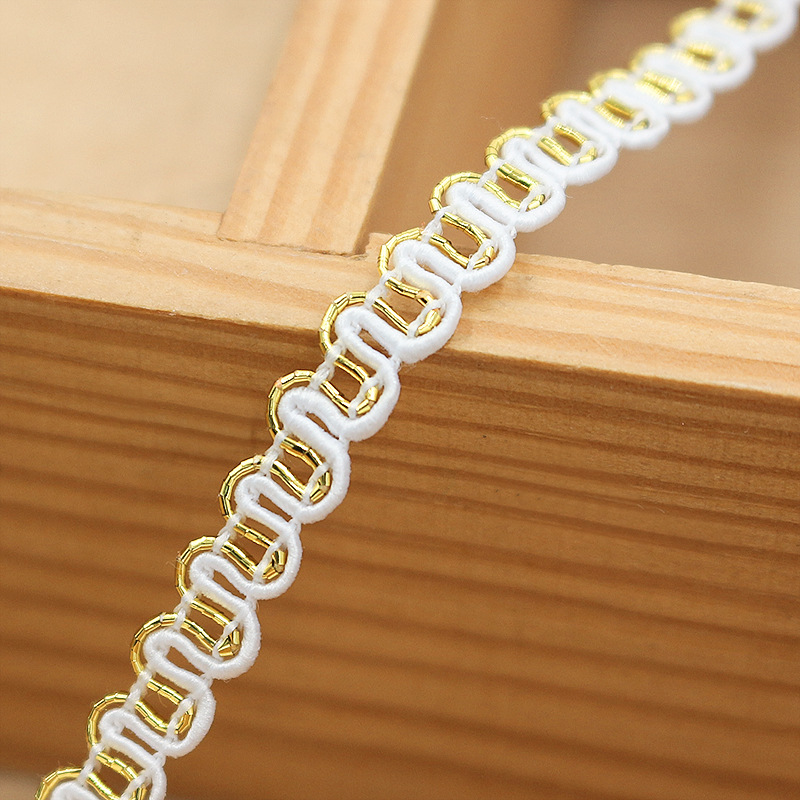 [10 M una tarjeta] 7mm de ancho de dos colores oro y plata ola pequeño encaje DIY ropa para niños cortina ropa de mujer accesorios decorativos