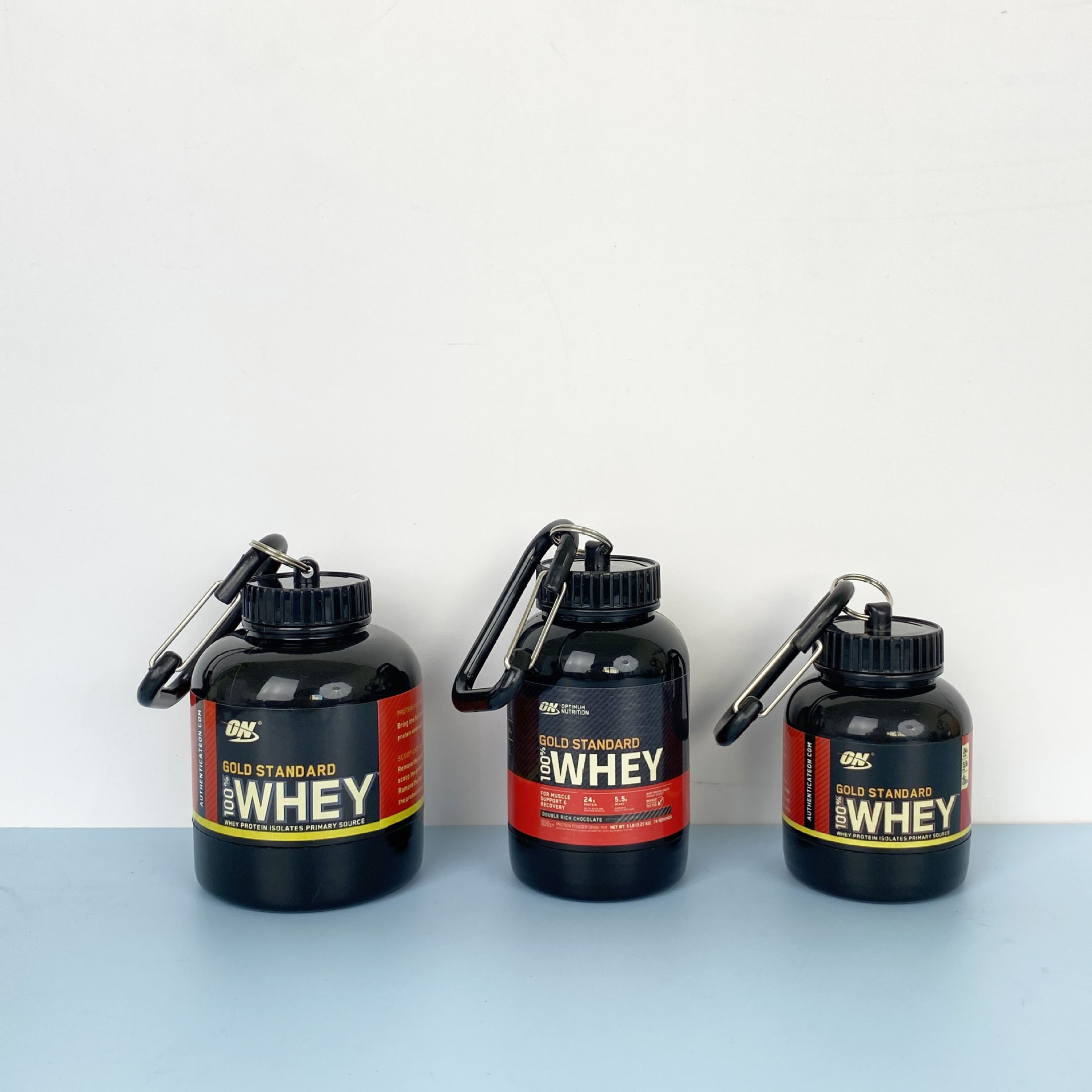 Fabricante 30g 45g 65g de proteína en polvo embudo cuadrado mosquetón portátil tamaño polvo olla en polvo de proteína en forma de barril