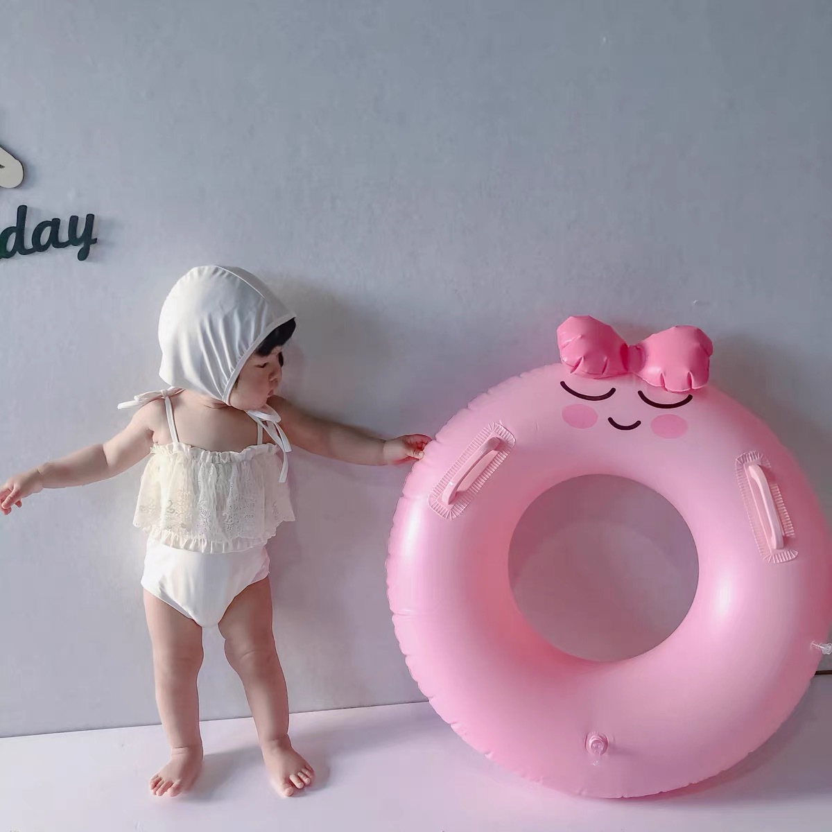 Inflatable fuchsia swimming ring PVC with bow