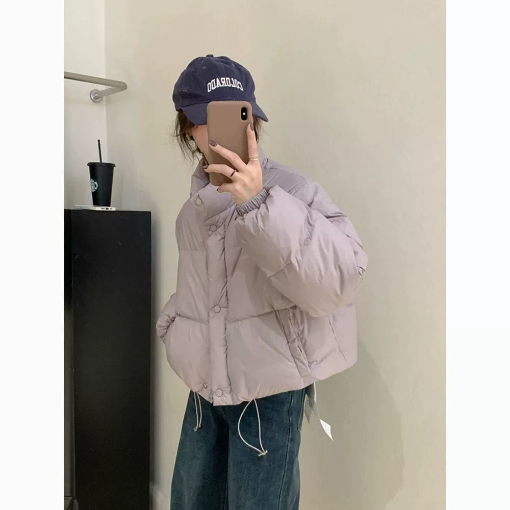 Новая хлопчатобумажная одежда для женщин короткая корейская свободная дикая стоячий воротник утолщенные теплые хлебные куртки зимой 2024 года
